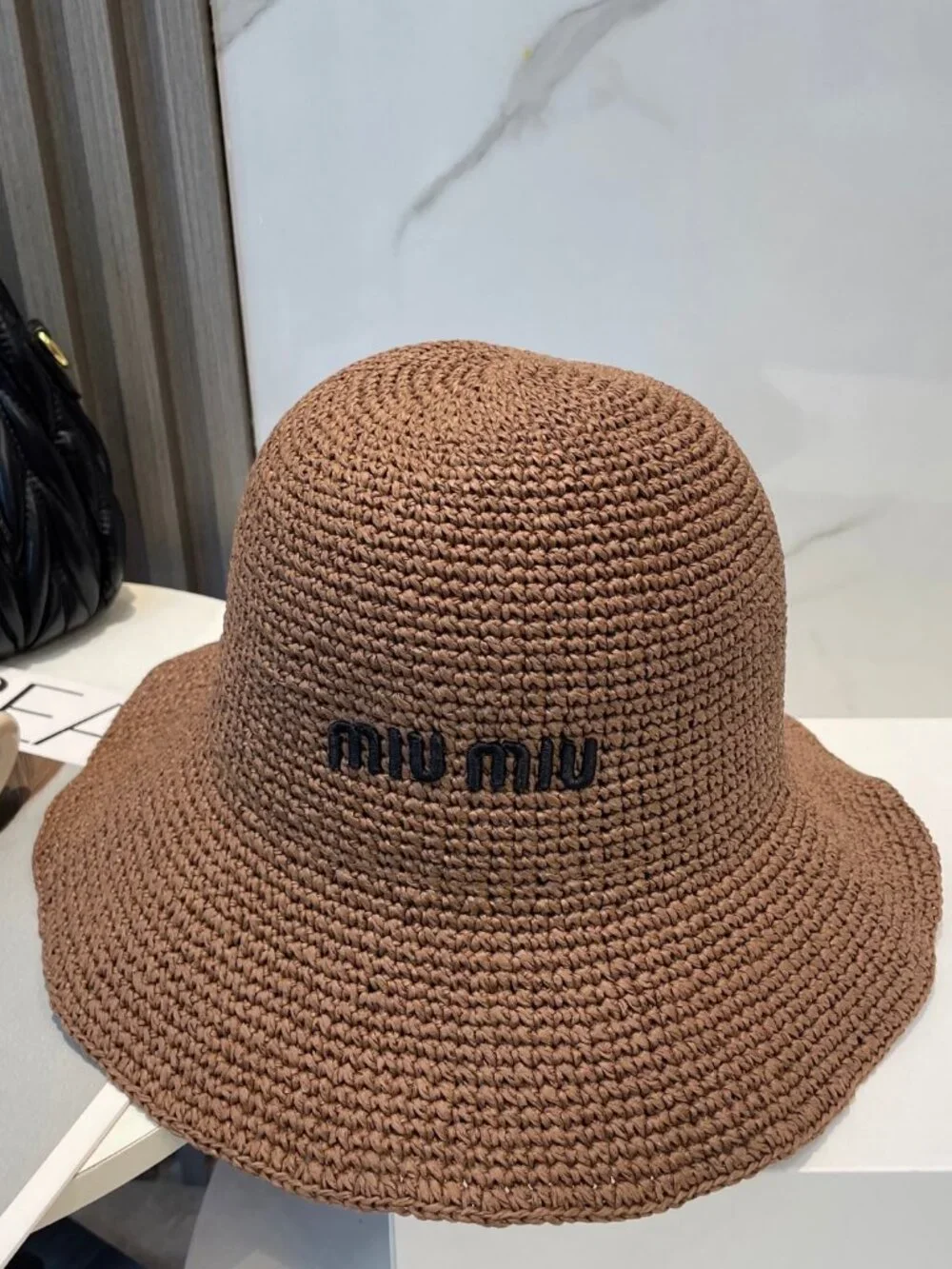 MIU MIU brown straw hat